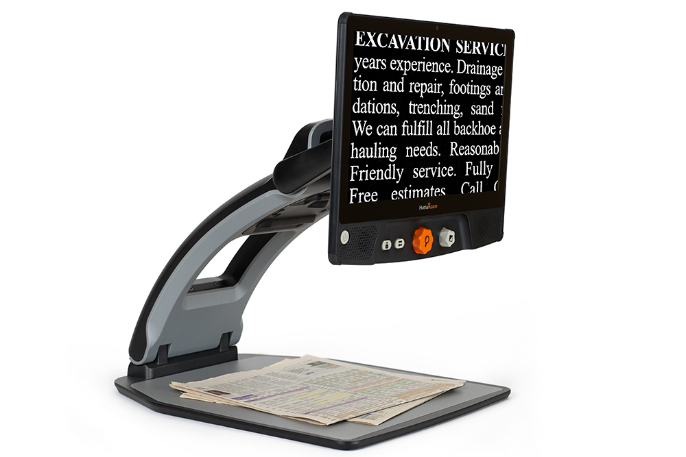 Reveal-16i-Angle-Newspaper-white-on-black-LR-1